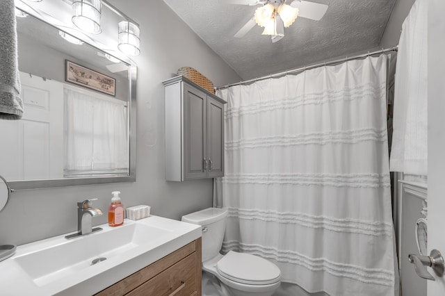 208 Westmoreland Ct, Georgetown, KY 40324 - bathroom with toilet, a textured ceiling, vanity, ceiling fan, and a shower with shower curtain