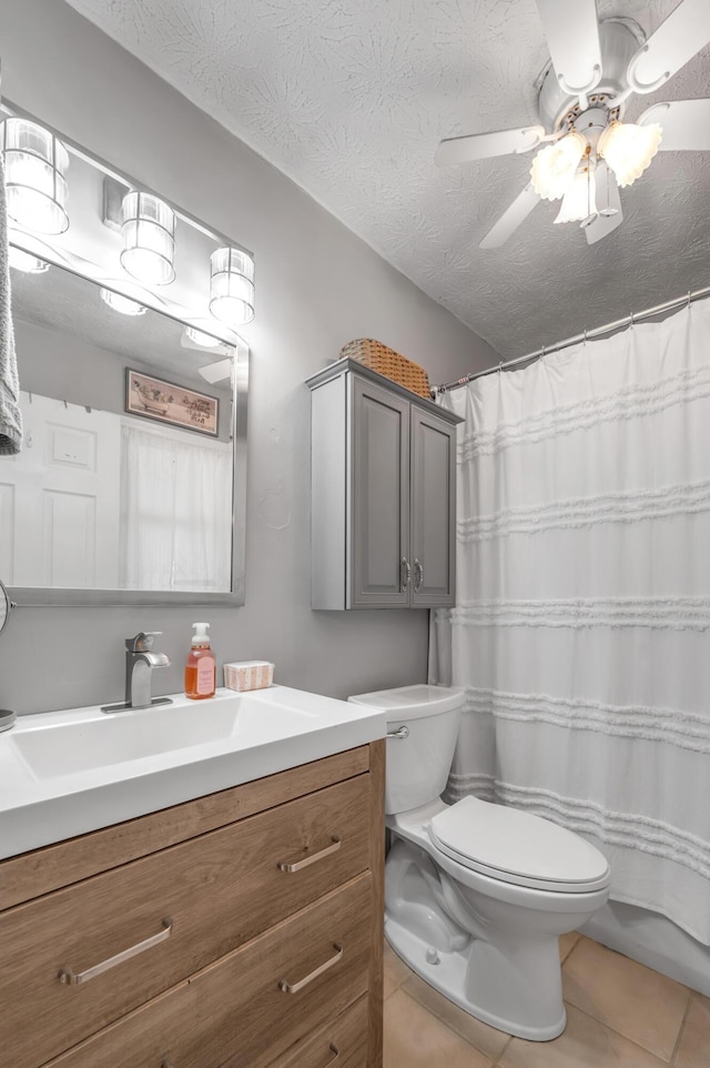 208 Westmoreland Ct, Georgetown, KY 40324 - full bathroom with toilet, vanity, tile patterned floors, a textured ceiling, and ceiling fan