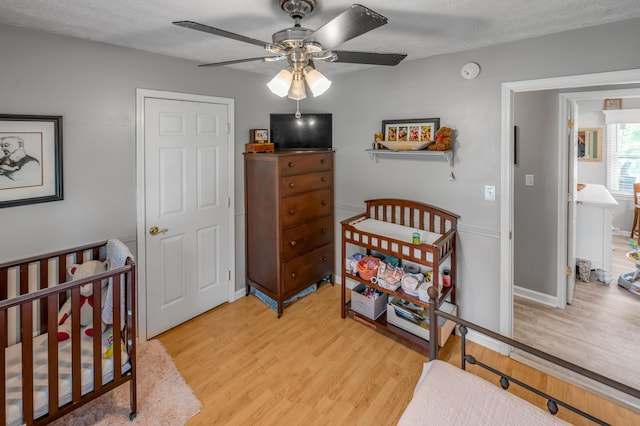 208 Westmoreland Ct, Georgetown, KY 40324 - bedroom featuring light wood-style flooring, ceiling fan, and baseboards