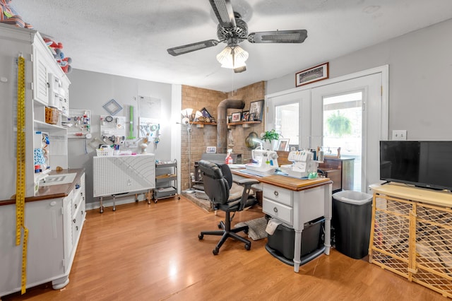 208 Westmoreland Ct, Georgetown, KY 40324 - office with ceiling fan, light wood-type flooring, french doors, and a textured ceiling