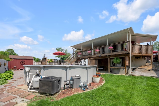 208 Westmoreland Ct, Georgetown, KY 40324 - back of house featuring an outdoor pool, a yard, a deck, and stairway