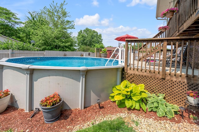208 Westmoreland Ct, Georgetown, KY 40324 - view of pool featuring stairs, a fenced backyard, and a wooden deck