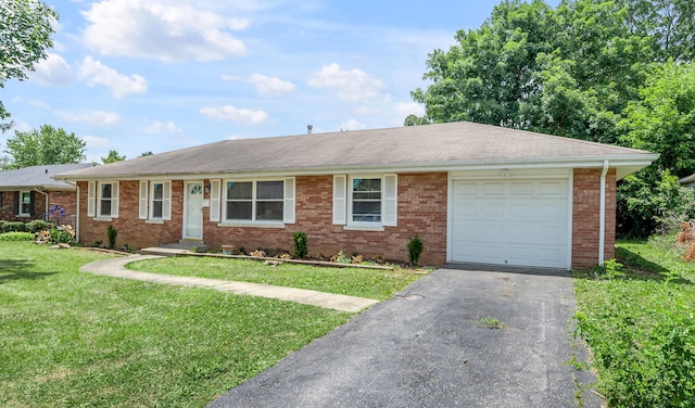 1626 Raleigh Rd, Lexington, KY 40505 - single story home with brick siding, driveway, a front yard, and a garage