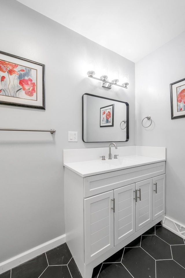 1626 Raleigh Rd, Lexington, KY 40505 - bathroom with tile patterned flooring and vanity