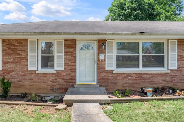 1626 Raleigh Rd, Lexington, KY 40505 - property entrance featuring brick siding and a shingled roof