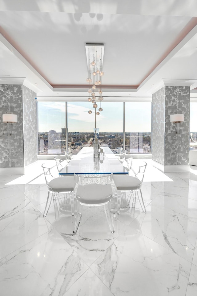 103 S Limestone St Unit 1150, Lexington, KY 40507 - dining space with a tray ceiling and expansive windows