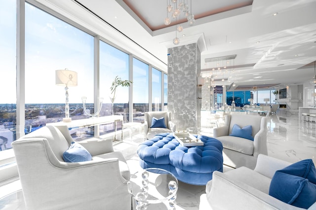 103 S Limestone St Unit 1150, Lexington, KY 40507 - living area featuring a chandelier and marble finish floors