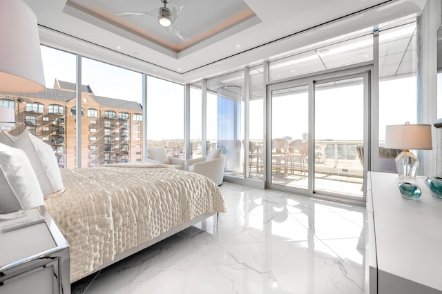 103 S Limestone St Unit 1150, Lexington, KY 40507 - bedroom featuring access to outside, marble tiled flooring, and expansive windows