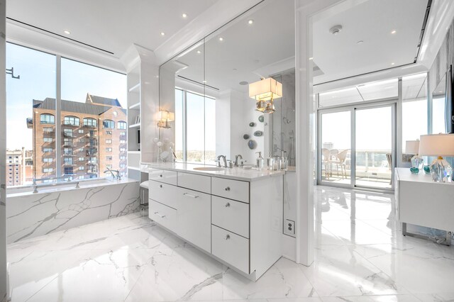 103 S Limestone St Unit 1150, Lexington, KY 40507 - full bath with vanity, a garden tub, marble tiled flooring, and a chandelier