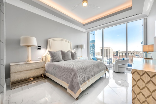 103 S Limestone St Unit 1150, Lexington, KY 40507 - bedroom with marble finish floors, a city view, a ceiling fan, and a raised ceiling