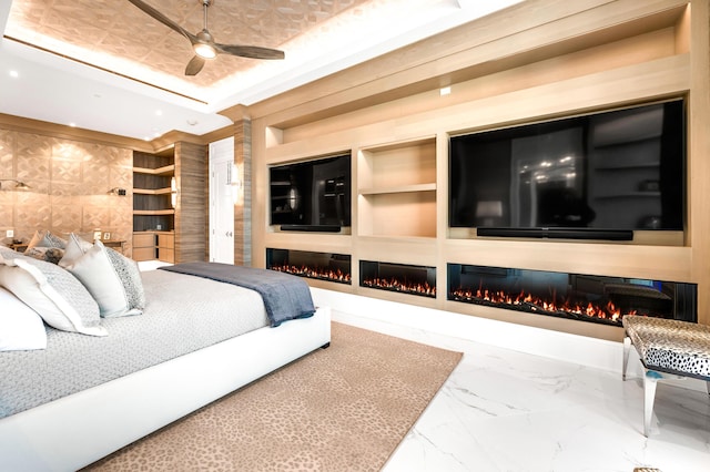 103 S Limestone St Unit 1150, Lexington, KY 40507 - bedroom with a glass covered fireplace, marble finish floors, a ceiling fan, and recessed lighting