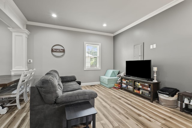 559 Breckenridge St, Lexington, KY 40508 - living area with ornate columns, crown molding, light wood finished floors, recessed lighting, and baseboards