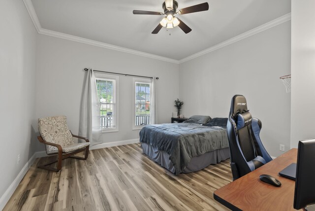 559 Breckenridge St, Lexington, KY 40508 - bedroom featuring crown molding, an office area, light wood-type flooring, baseboards, and a ceiling fan