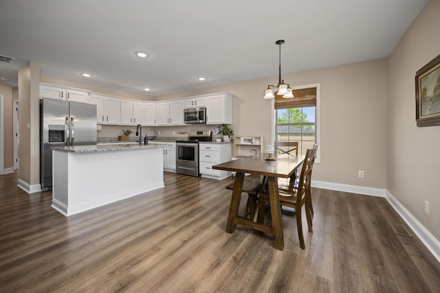 504 Martin Dr, Richmond, KY 40475 - dining space featuring dark wood-type flooring, a chandelier, baseboards, and recessed lighting