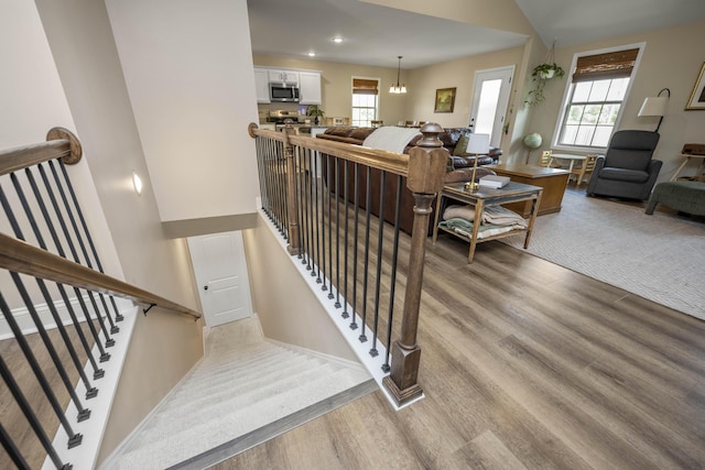 504 Martin Dr, Richmond, KY 40475 - staircase featuring wood finished floors, healthy amount of natural light, baseboards, and recessed lighting