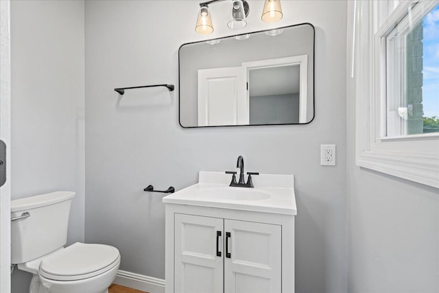 113 Buckwood Dr, Richmond, KY 40475 - half bathroom with vanity, toilet, and baseboards