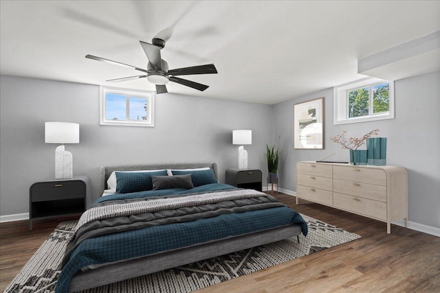 113 Buckwood Dr, Richmond, KY 40475 - bedroom with baseboards, dark wood-style flooring, and a ceiling fan