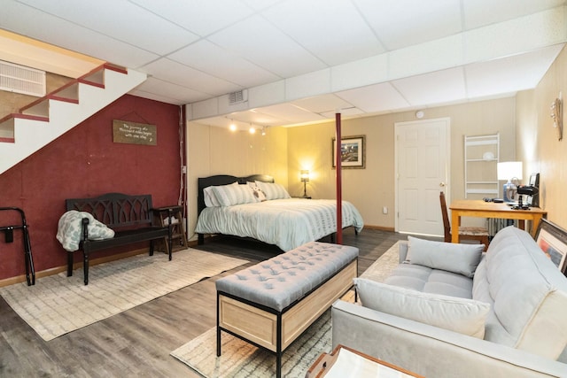 21 Vicki St, Nancy, KY 42544 - bedroom featuring wood finished floors, baseboards, and a paneled ceiling