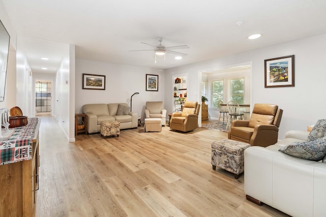 21 Vicki St, Nancy, KY 42544 - living room with light wood finished floors, a ceiling fan, recessed lighting, healthy amount of natural light, and baseboards