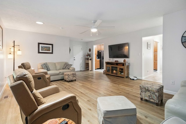 21 Vicki St, Nancy, KY 42544 - living room with ceiling fan, light wood-type flooring, baseboards, and recessed lighting