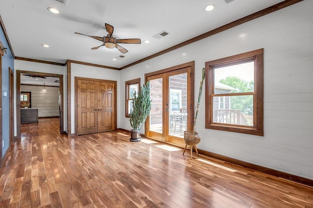 372 Sussex Ln, Nicholasville, KY 40356 - entrance foyer with baseboards, wood finished floors, a ceiling fan, ornamental molding, and french doors