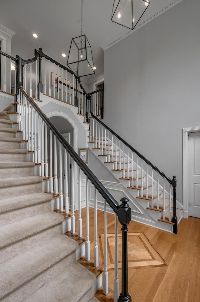 2245 Abbeywood Rd, Lexington, KY 40515 - staircase with recessed lighting, a towering ceiling, baseboards, and a chandelier