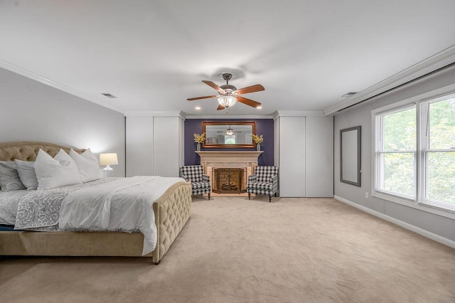 2245 Abbeywood Rd, Lexington, KY 40515 - bedroom featuring ornamental molding, multiple closets, light carpet, a fireplace, and a ceiling fan