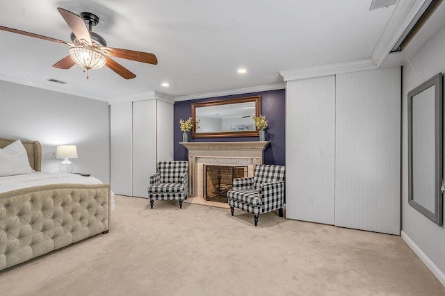2245 Abbeywood Rd, Lexington, KY 40515 - bedroom featuring carpet floors, crown molding, a fireplace with raised hearth, recessed lighting, and two closets