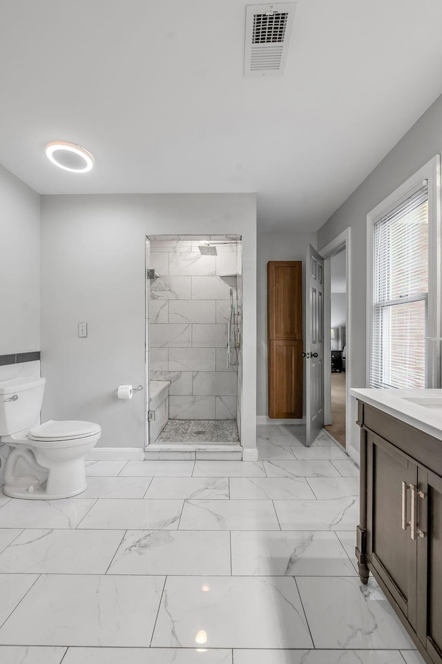 2245 Abbeywood Rd, Lexington, KY 40515 - bathroom with baseboards, vanity, marble finish floors, a marble finish shower, and toilet