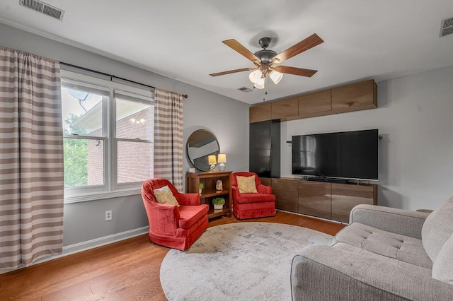 2245 Abbeywood Rd, Lexington, KY 40515 - living room featuring light wood finished floors, plenty of natural light, a ceiling fan, and baseboards