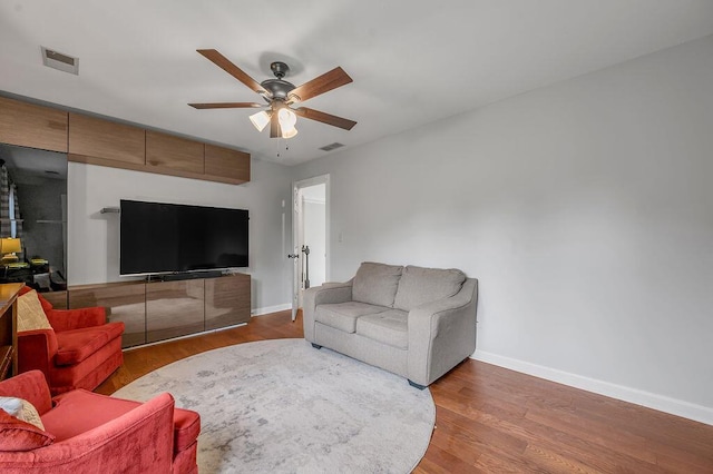 2245 Abbeywood Rd, Lexington, KY 40515 - living room featuring baseboards, a ceiling fan, and wood finished floors