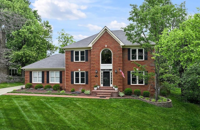 2245 Abbeywood Rd, Lexington, KY 40515 - colonial inspired home featuring brick siding, a front yard, and roof with shingles