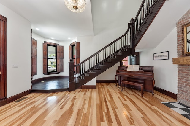 105 E 4th St, Augusta, KY 41002 - foyer with stairway, wood finished floors, and baseboards