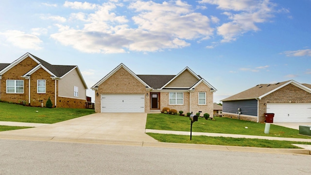 345 Memory Ln, Richmond, KY 40475 - view of front of house with driveway, a front lawn, brick siding, and a garage