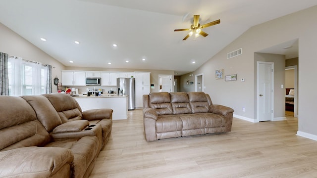 345 Memory Ln, Richmond, KY 40475 - living area featuring light wood finished floors, a ceiling fan, recessed lighting, baseboards, and high vaulted ceiling