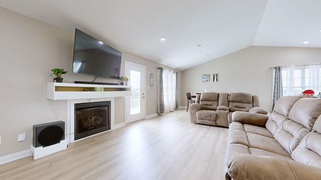 345 Memory Ln, Richmond, KY 40475 - living room featuring wood finished floors, plenty of natural light, lofted ceiling, a fireplace, and baseboards