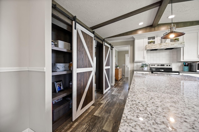 5483 US Highway 150 E, Stanford, KY 40484 - kitchen featuring a barn door, electric range, a textured ceiling, dark wood-style floors, and white cabinets