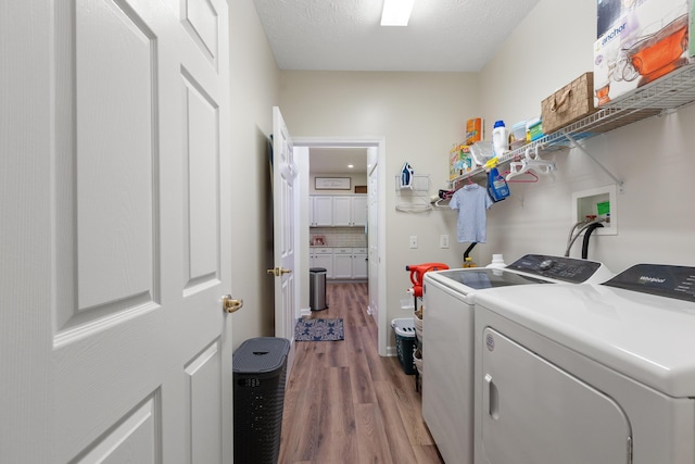 196 Academy Dr, Wilmore, KY 40390 - laundry area featuring light wood-type flooring and washer and clothes dryer