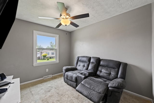 263 S Eagle Creek Dr, Lexington, KY 40515 - living area with a ceiling fan, carpet, a textured ceiling, and baseboards