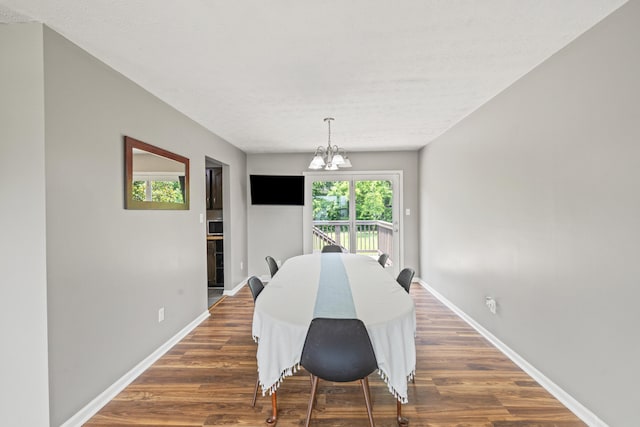 263 S Eagle Creek Dr, Lexington, KY 40515 - dining space featuring a chandelier, baseboards, and dark wood finished floors