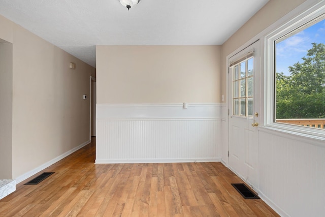 1780 Ballard Rd, Lawrenceburg, KY 40342 - spare room with light wood-style floors and a wainscoted wall