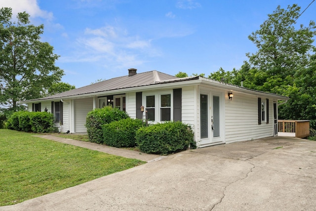 1780 Ballard Rd, Lawrenceburg, KY 40342 - view of front of house featuring a front yard, a metal roof, driveway, and a chimney