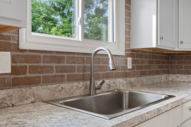 1780 Ballard Rd, Lawrenceburg, KY 40342 - kitchen view of tasteful backsplash, white cabinets, and light countertops