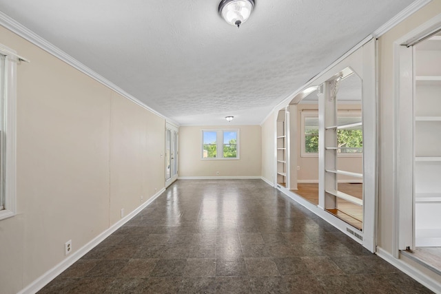 1780 Ballard Rd, Lawrenceburg, KY 40342 - unfurnished room with a textured ceiling, arched walkways, built in shelves, and crown molding