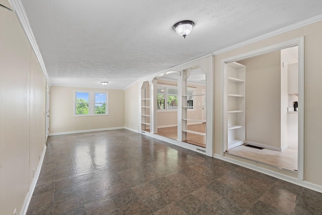 1780 Ballard Rd, Lawrenceburg, KY 40342 - unfurnished room featuring built in shelves, a textured ceiling, arched walkways, and crown molding