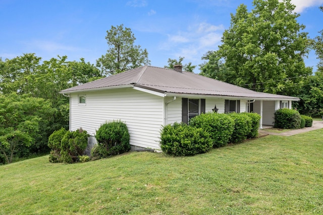 1780 Ballard Rd, Lawrenceburg, KY 40342 - view of side of property featuring a lawn, a metal roof, and a chimney