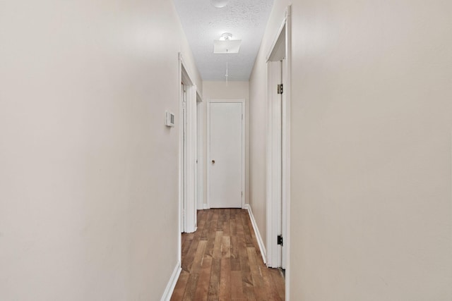 1780 Ballard Rd, Lawrenceburg, KY 40342 - hallway with attic access, a textured ceiling, and dark wood-style flooring
