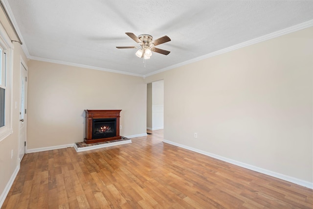 1780 Ballard Rd, Lawrenceburg, KY 40342 - unfurnished living room with ceiling fan, light wood finished floors, a warm lit fireplace, and ornamental molding