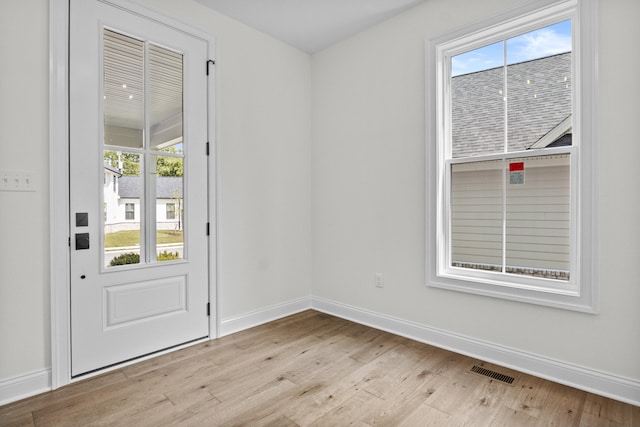 3521 Harper Woods Ln, Lexington, KY 40515 - doorway with light wood-type flooring and baseboards