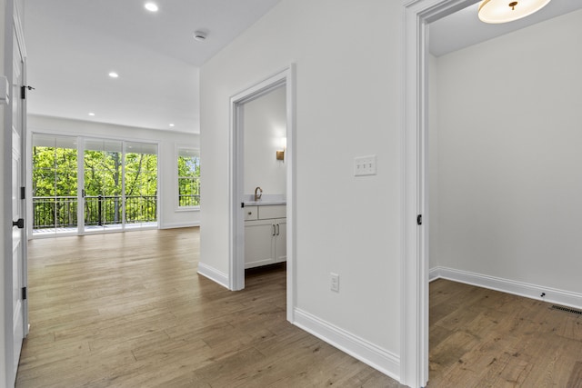 3521 Harper Woods Ln, Lexington, KY 40515 - hall featuring light wood finished floors, recessed lighting, and baseboards